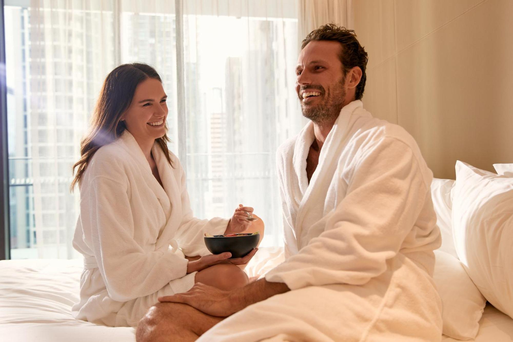 The Westin Brisbane Hotel Bagian luar foto A couple wearing bathrobes